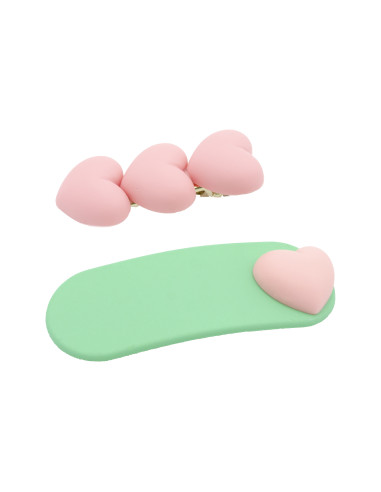 Pack de 2 clips medianos infantiles con forma de corazones en rosa y plano en color verde con corazón en rosa